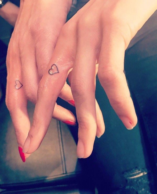 Minimize Heart Tattoo On Finger
