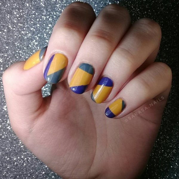 Mustard and blue geometric nail art