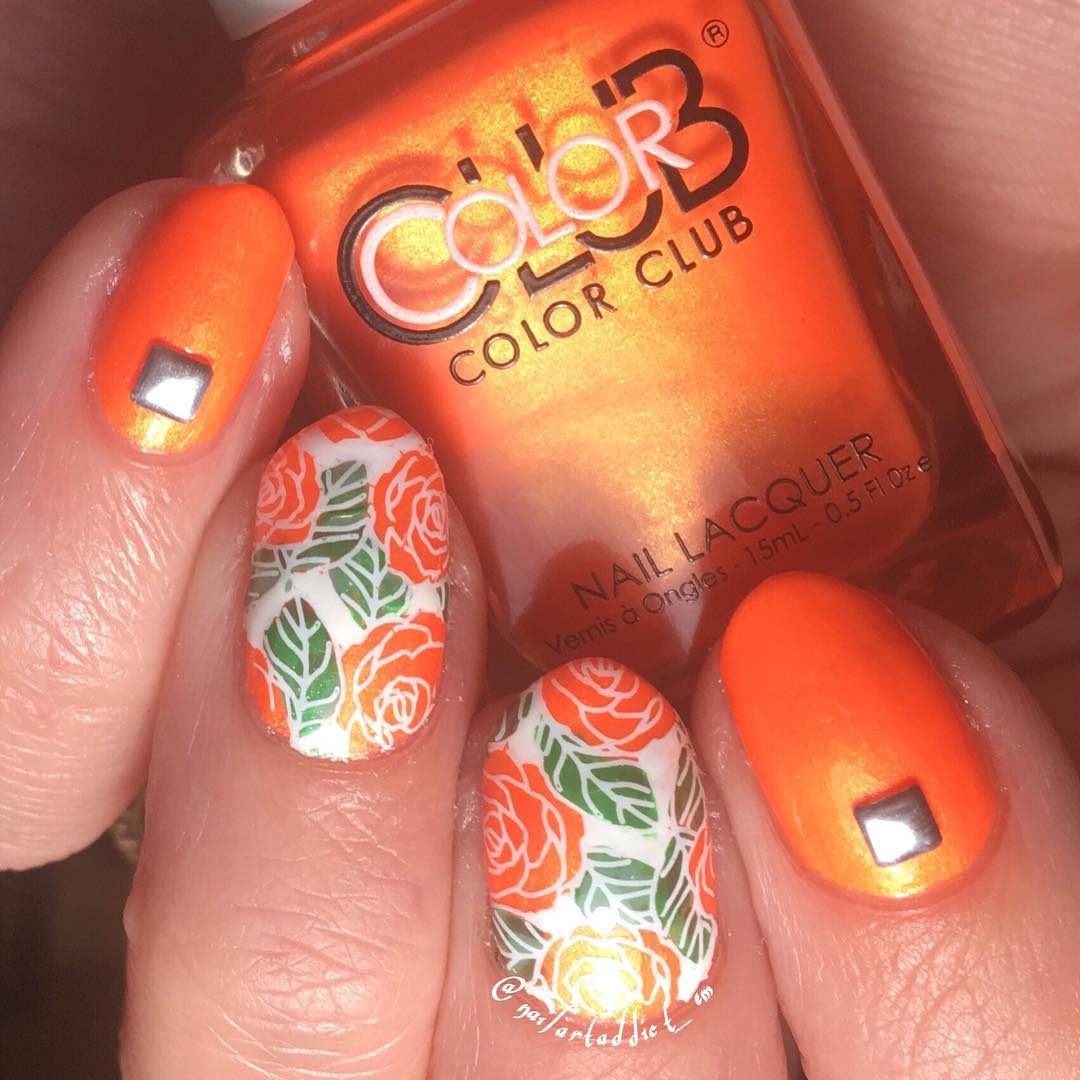 Orange Nails With Handpainted Flower