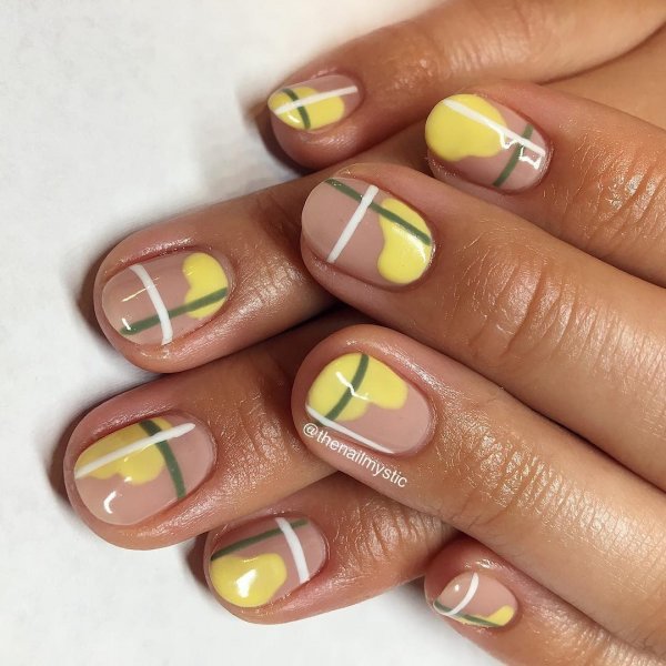Pastel yellow geometric nails