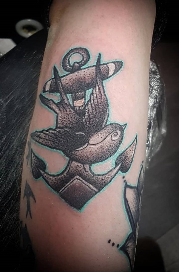 Pretty dotwork anchor tattoo with bird