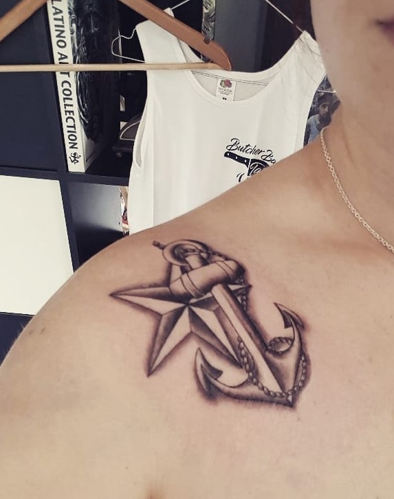 Realistic anchor tattoo on shoulder