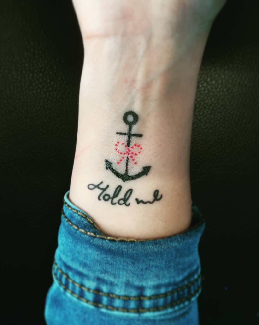 Romantic hold me anchor tattoo