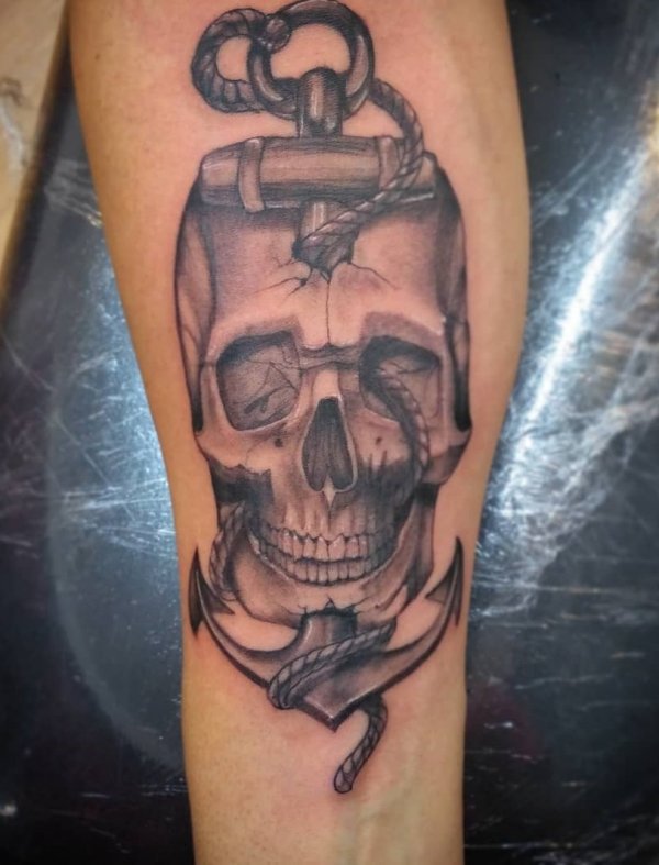 Scary skull tattoo with anchor