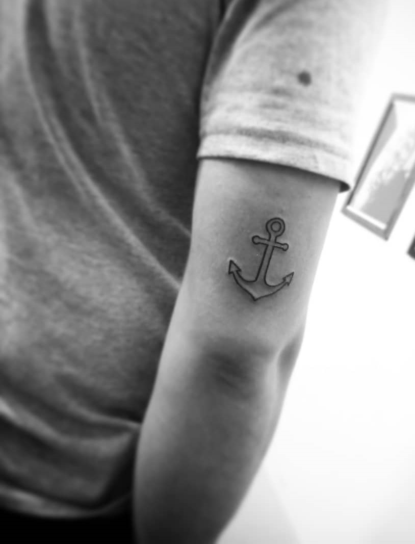 Simple linework anchor tattoo on half sleeve