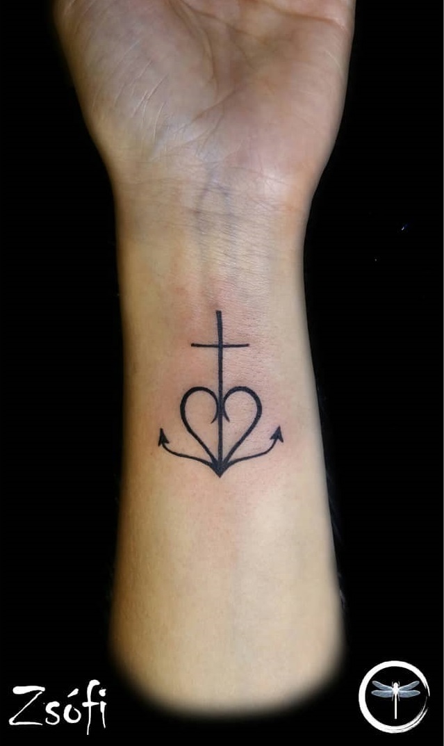 Unique minimal anchor tattoo with heart on wrist