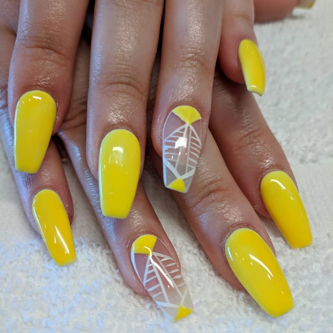 Yellow tribal geometric nails