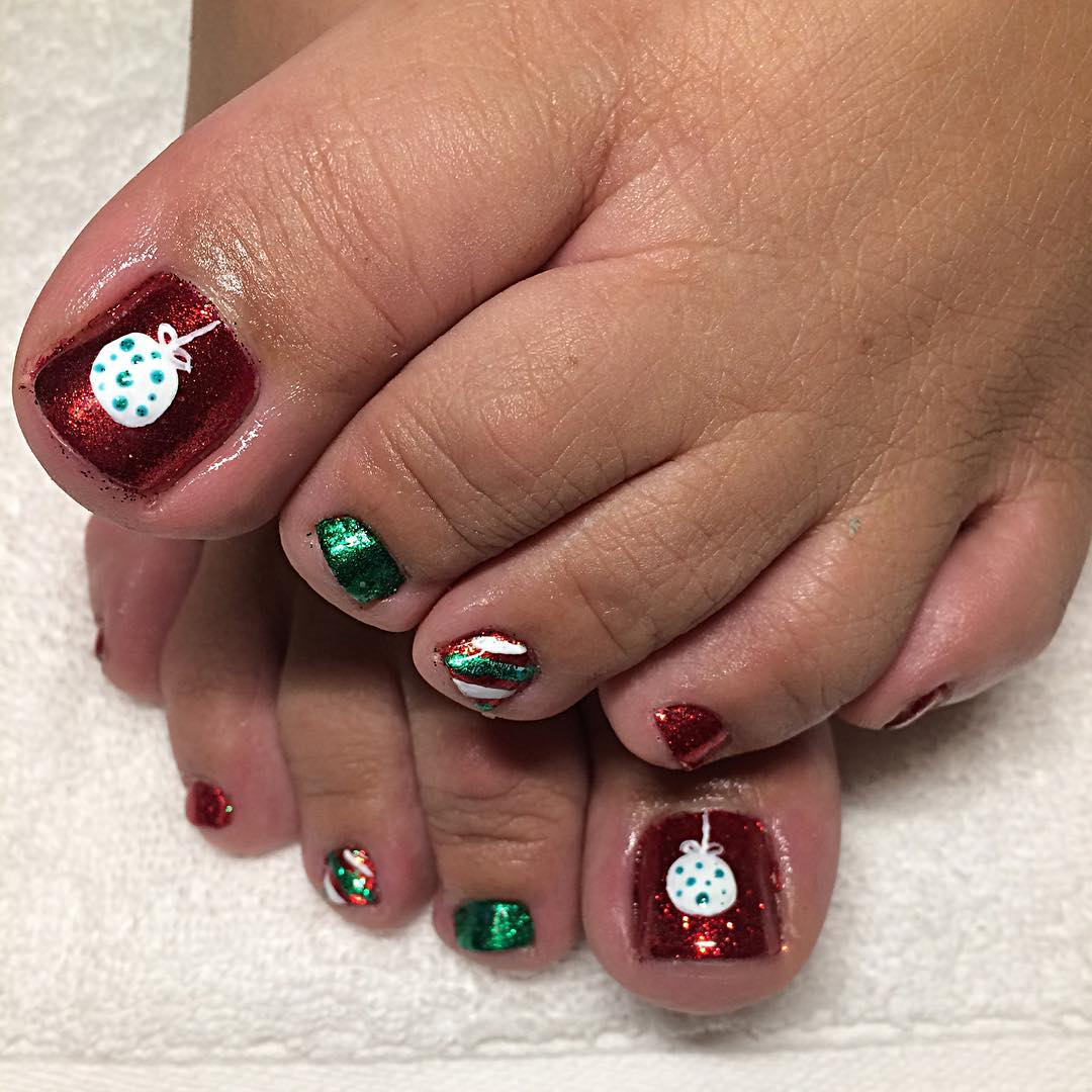 Handpainted red & green nails with Christmas ornaments. Pic by ajl.nails