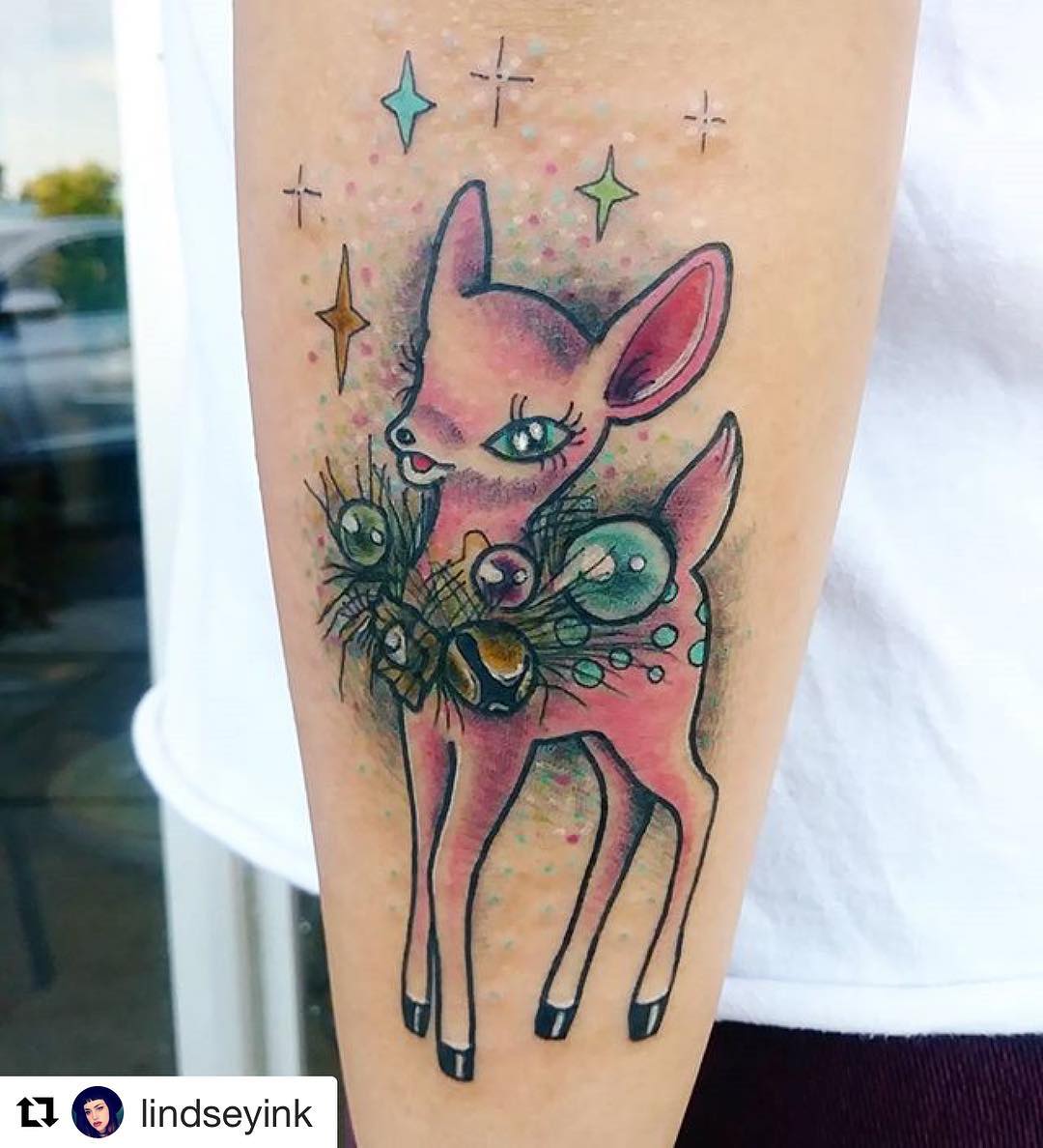 Alluring reindeer arm tattoo.