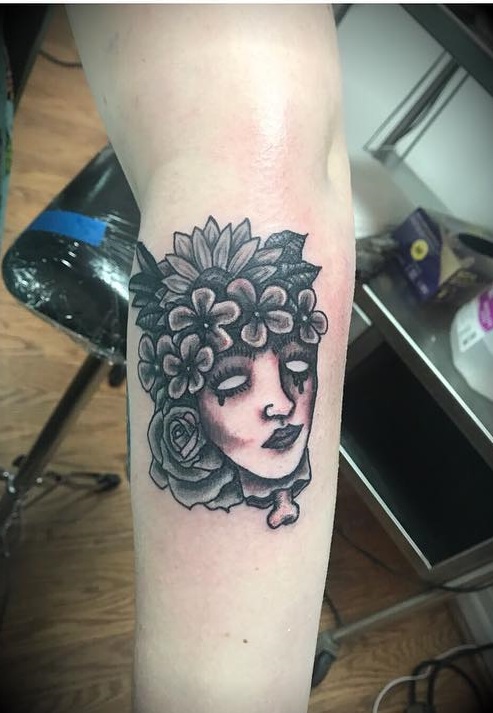 Black and grey zombie tattoo with rose and sunflower. Creepy Tattoo Ideas