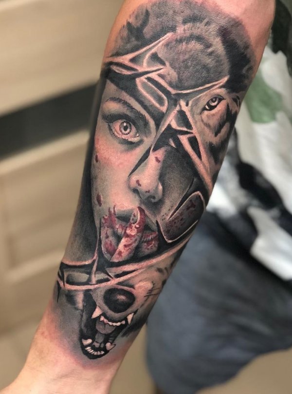 Bloody face tattoo with wolf. Creepy Tattoo Ideas