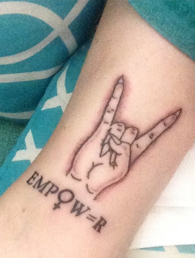 Impressive empower tattoo. Pic by hedahayden
