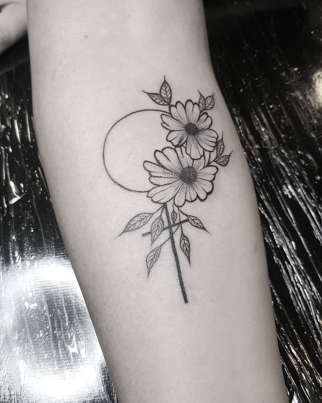 Line work floral tattoo on arm. Pic by linpimenteltattoo