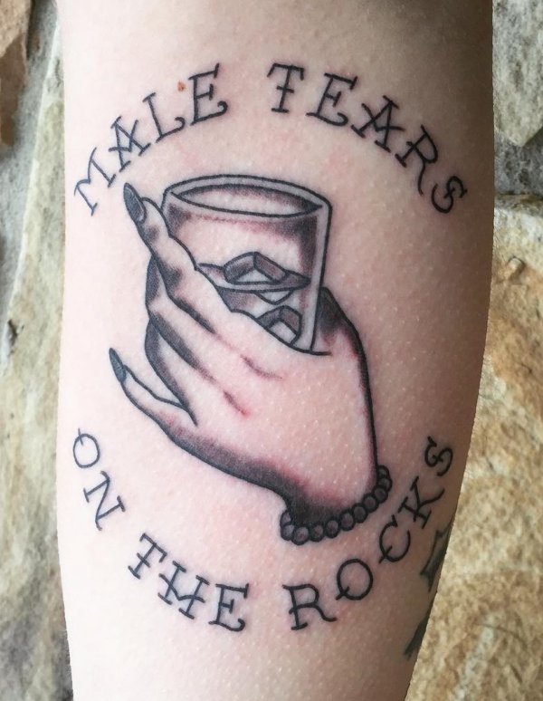 Male Tears On The Rocks feminist tattoo. Pic by loganisaacson