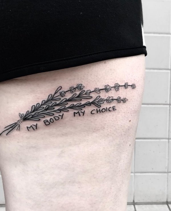 My Body My Choice line work feminist tattoo on ribs. Pic by enki.ink