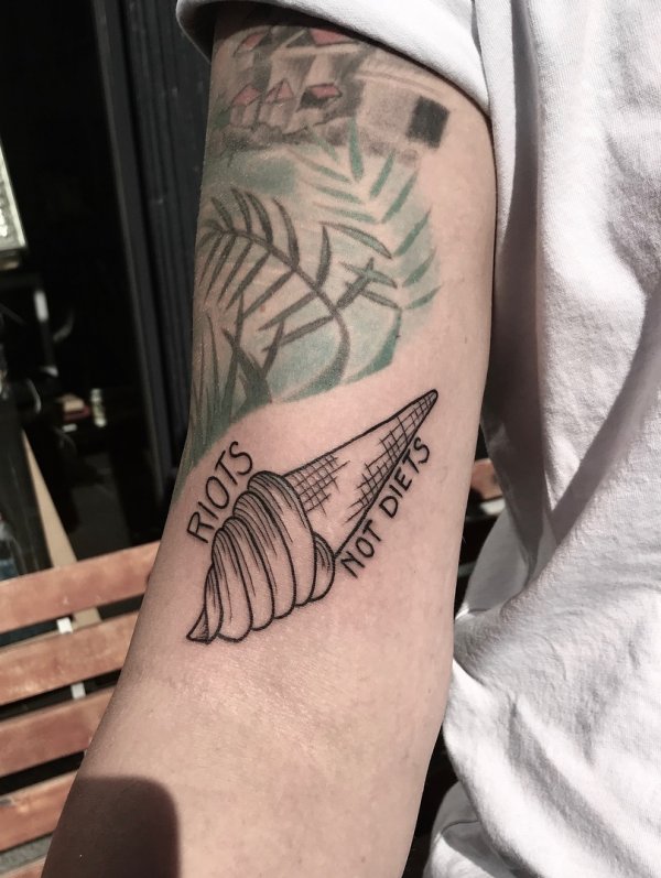 Riots Not Diets linework feminist tattoo. Pic by enki.ink