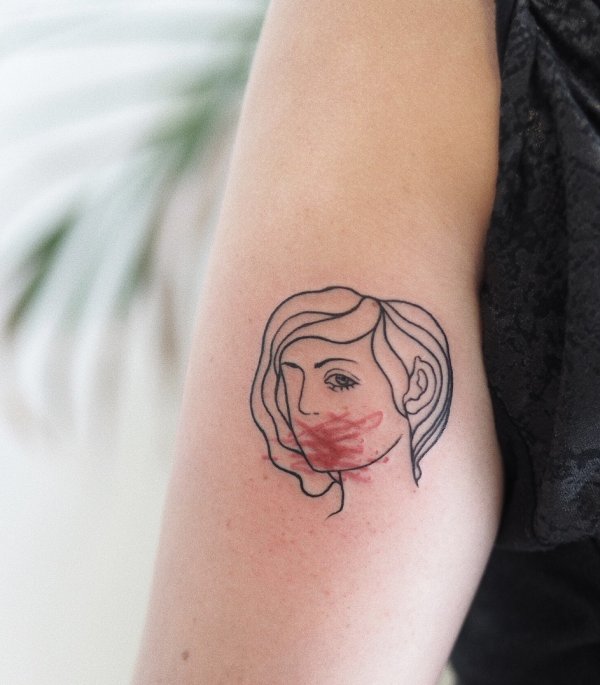 Wonderful line work feminist tattoo. Pic by moialena_