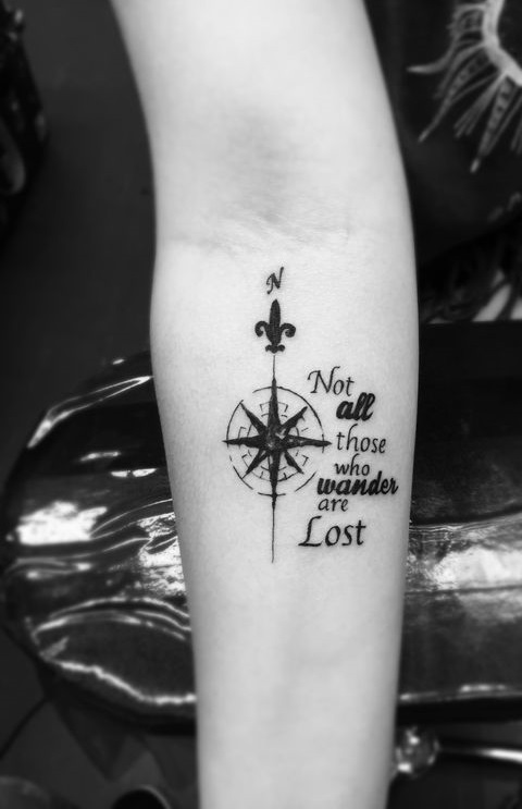 Amazing 'Not all those who wander are lost' compass tattoo.
