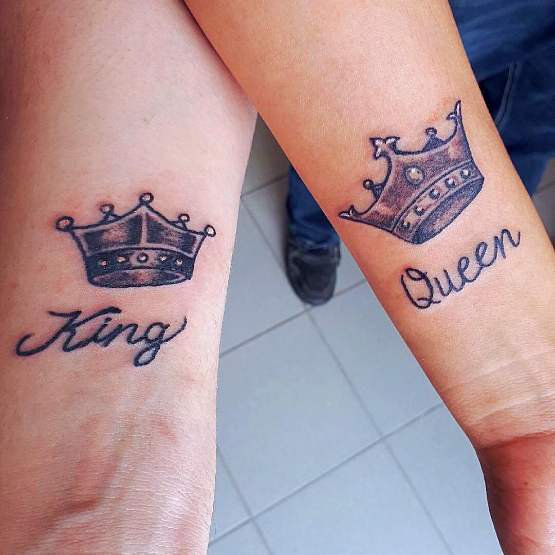Another grey king and queen crown tattoos on wrist for couple.