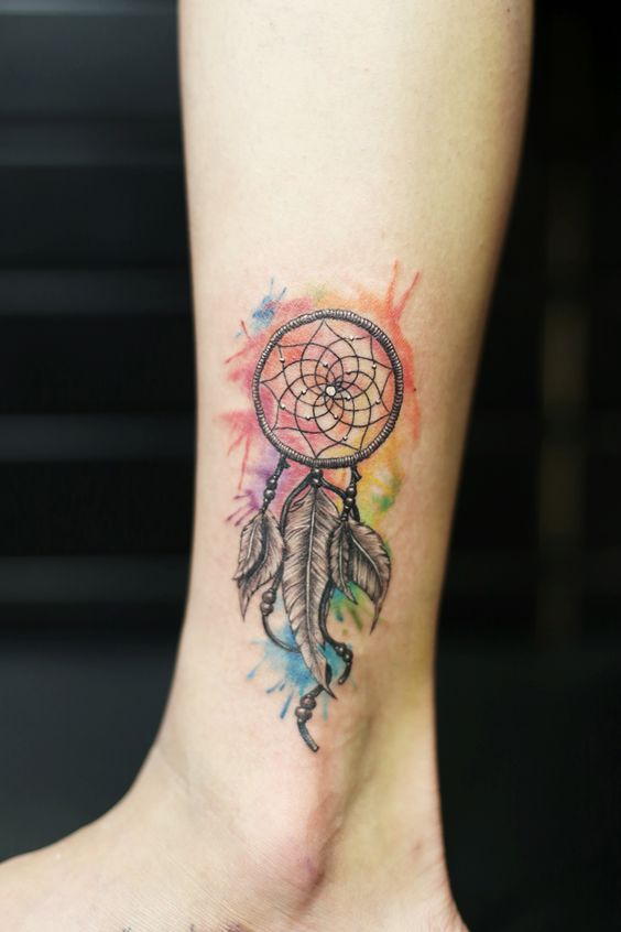 Dreamcatcher lower leg Watercolor Tattoo designs for girls.