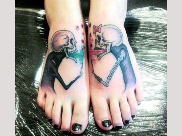Mind-blowing skull tattoos couple on both foot.