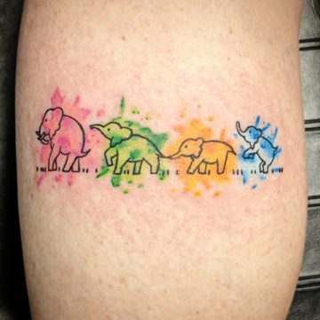Small Elephant family walking in line tattoo designs for lower leg.