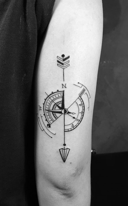 This arm compass tattoo boasts clean lines.