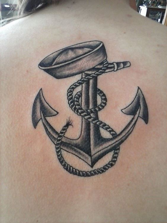 Black and grey navy anchor on back.