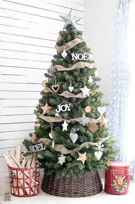 Classic rustic Christmas tree decorated with burlap and star & heart ornaments.