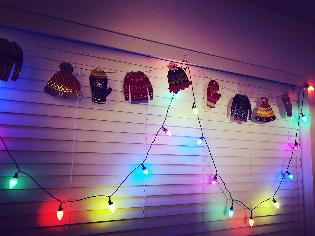 Clothes and light on window for Christmas decor.