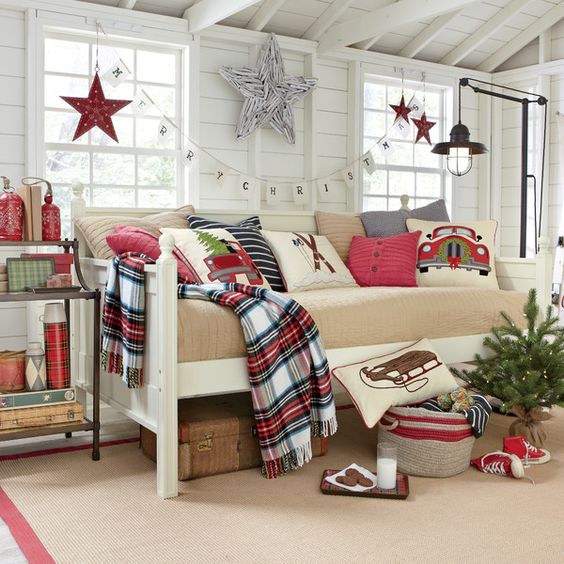 Merry Christmas banner, rustic star,, plaid and Christmas theme cushions.