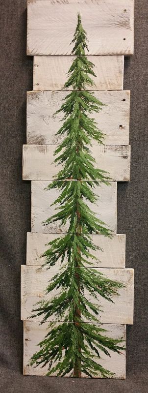 Reclaimed pallet board hand painted in green as tree.