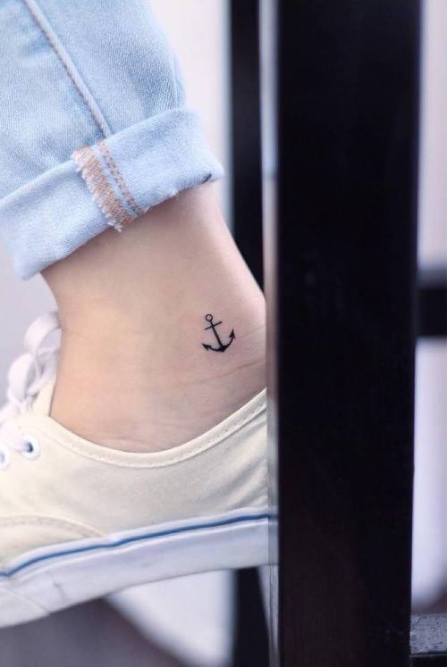 Tiny anchor tattoos on inner ankle for girls.