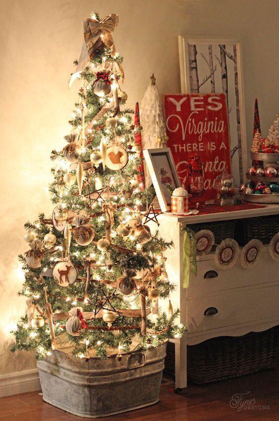 Tradition rustic Christmas tree with wooden ornaments.