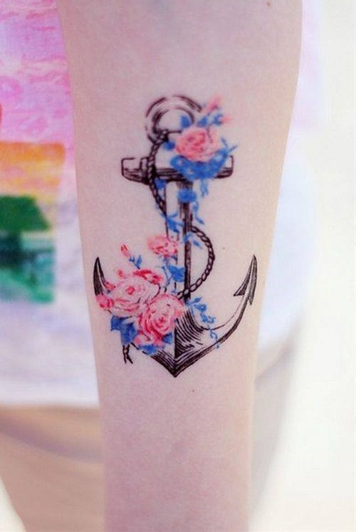 Watercolor flowers with anchor tattoo, it is a beautiful combination.
