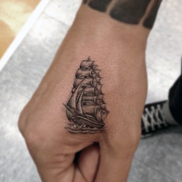 A small ship tattoo and sea waves can explain a story of hard life and brave attitude.