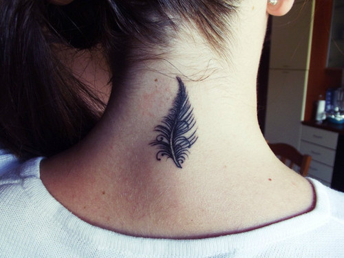 Adorable feather neck tattoo.