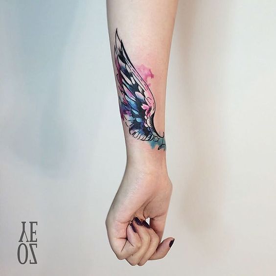 Amazing Watercolor Wing Wrist Tattoo.