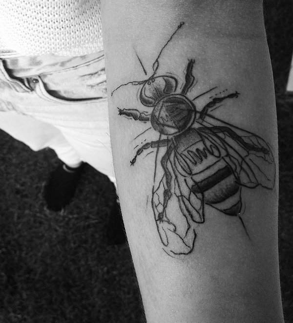 Angry bee tattoo design.