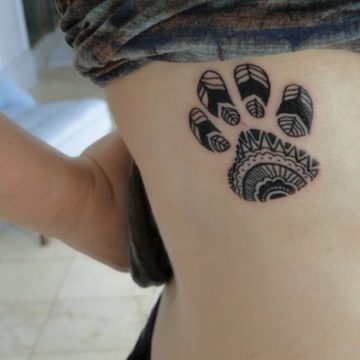 Artistic dog paw tattoo idea.
