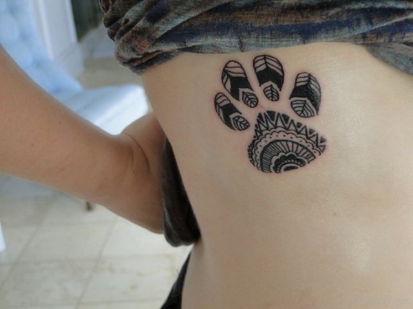 Artistic dog paw tattoo idea.