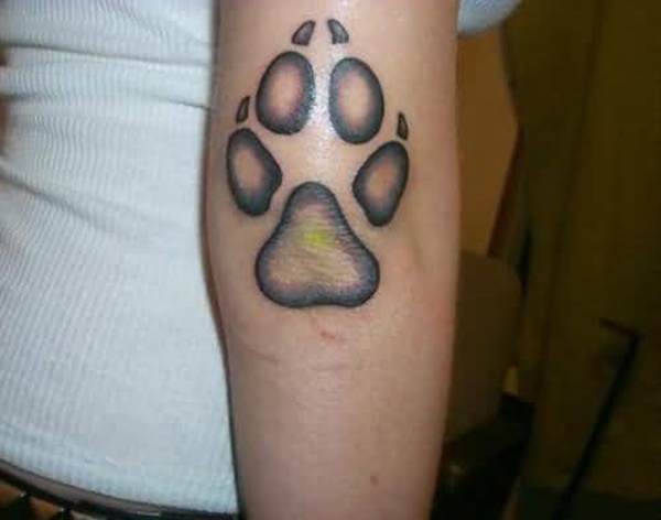 Attractive and simple dog paw print tattoo.