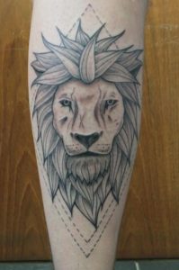 Awesome Lion Calf Tattoos For Females.