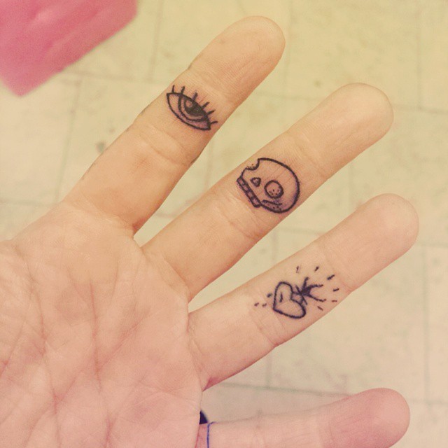 Awesome finger tattoo for women.