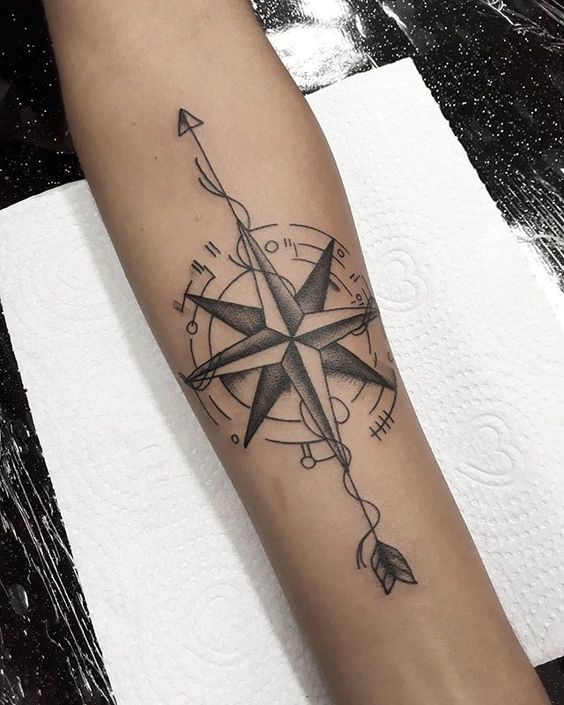 Beautiful Compass And Arrow Tattoo.