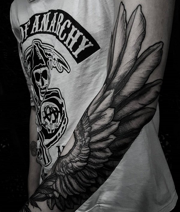 Beautiful Wing Forearm Tattoo.