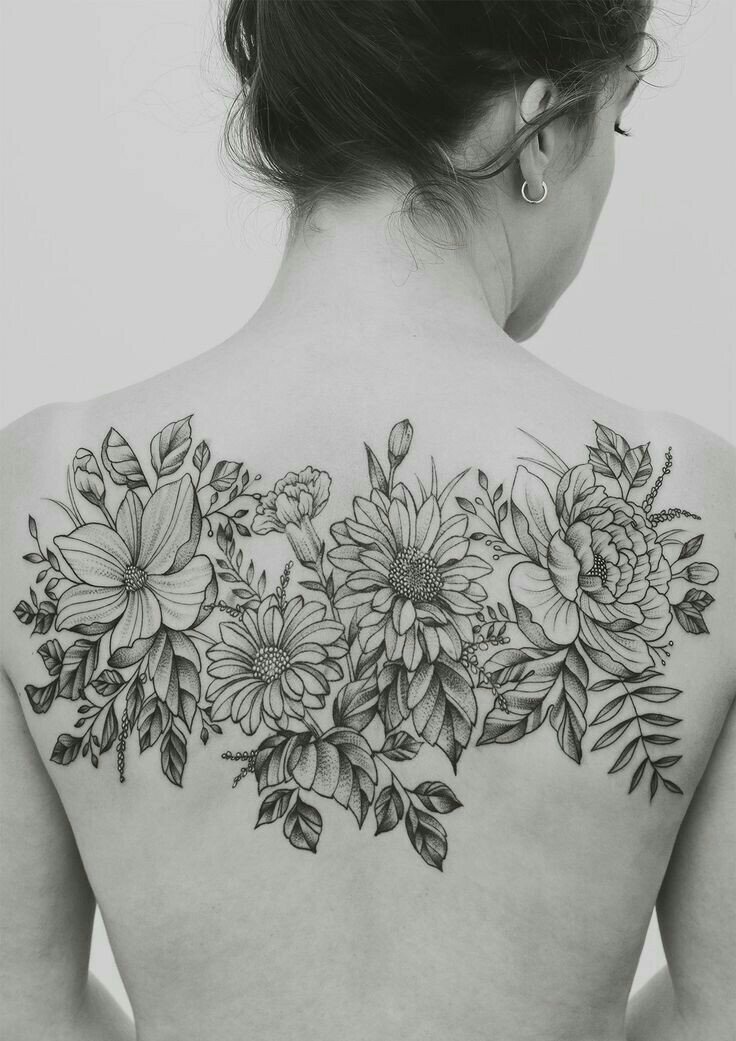 Beautiful dot and line work flowers on back.