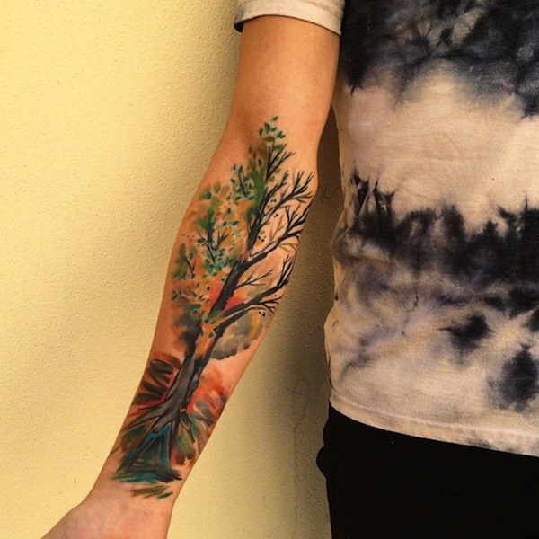 Best colorful tree tattoo on forearm.