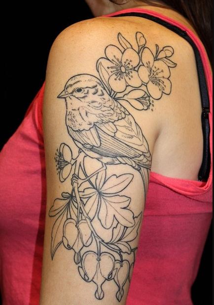 Bird and flowers tattoos on sleeves.