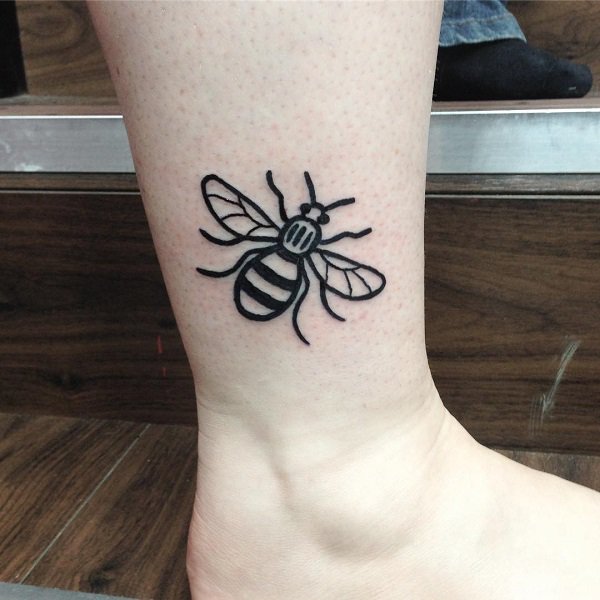 Bold black bee tattoo is perfect for the person with bold personality.
